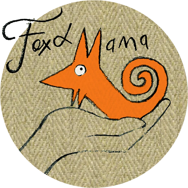 Le logo Fox & Mama : un renard orange dans le creux d'une main.